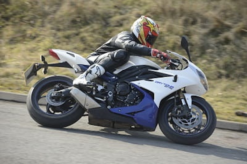 Rider is Bike Social's six foot four Marc Potter. The bike is tiny but man can it find some grip when the roads are cold. Suspension is taut but not jarring. It's a sports bike however and you won't forget that in a hurry.