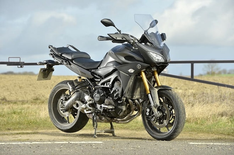 Moody skies, and the moody black Tracer. It even comes with a centrestand.