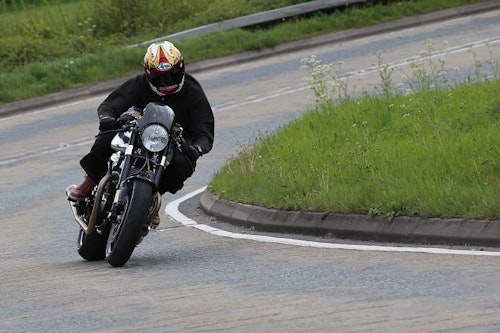 Head down, on the pipe. Norton Dominator SS Number One attempts to wake up Leicestershire.
