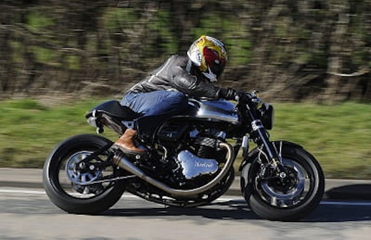 Norton Domiracer at full chat. Well, gently kissing the corner. All you need to know is that it handles and it's SO BLUMMIN' LOUD!