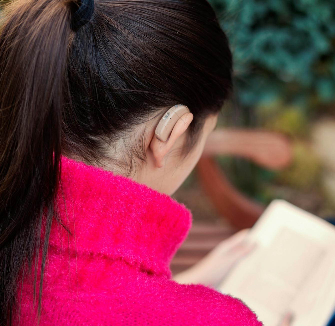 woman wearing hearing aids