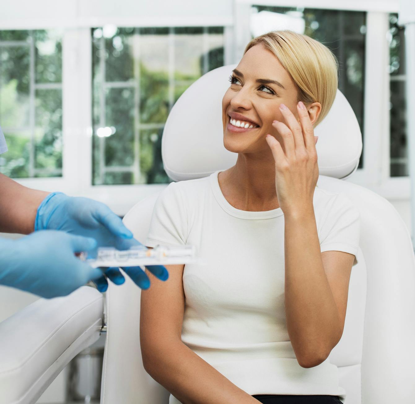 woman in a white shirt smiling