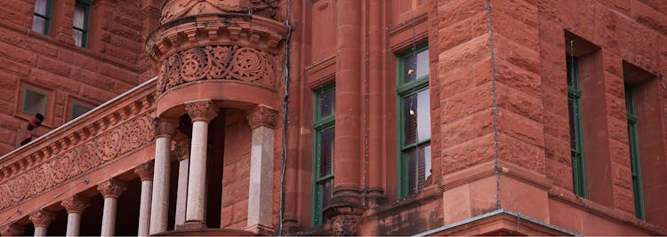 The outside of a brown brick building