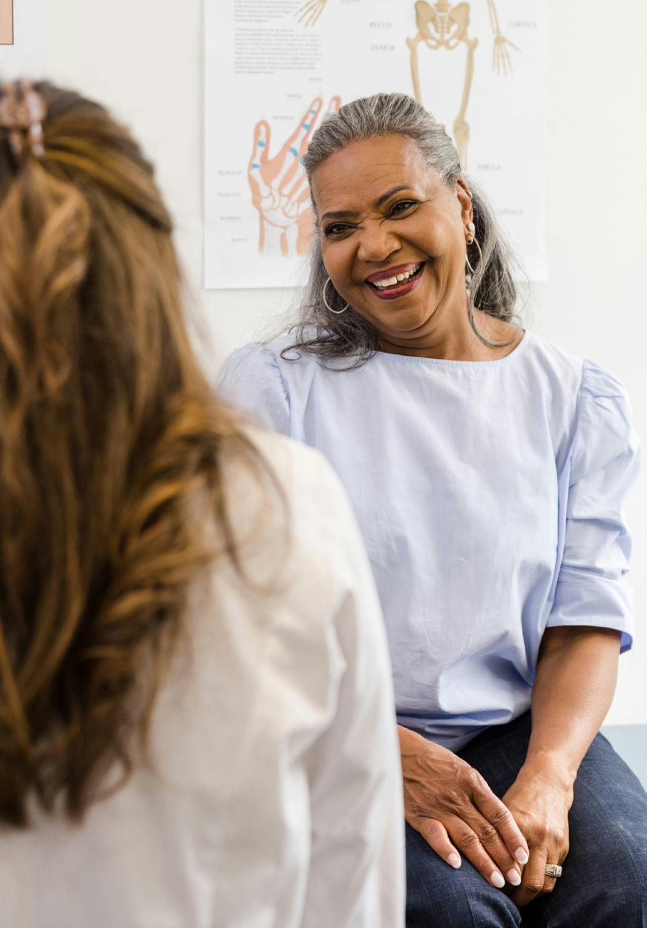 Woman sitting in a doctor's office