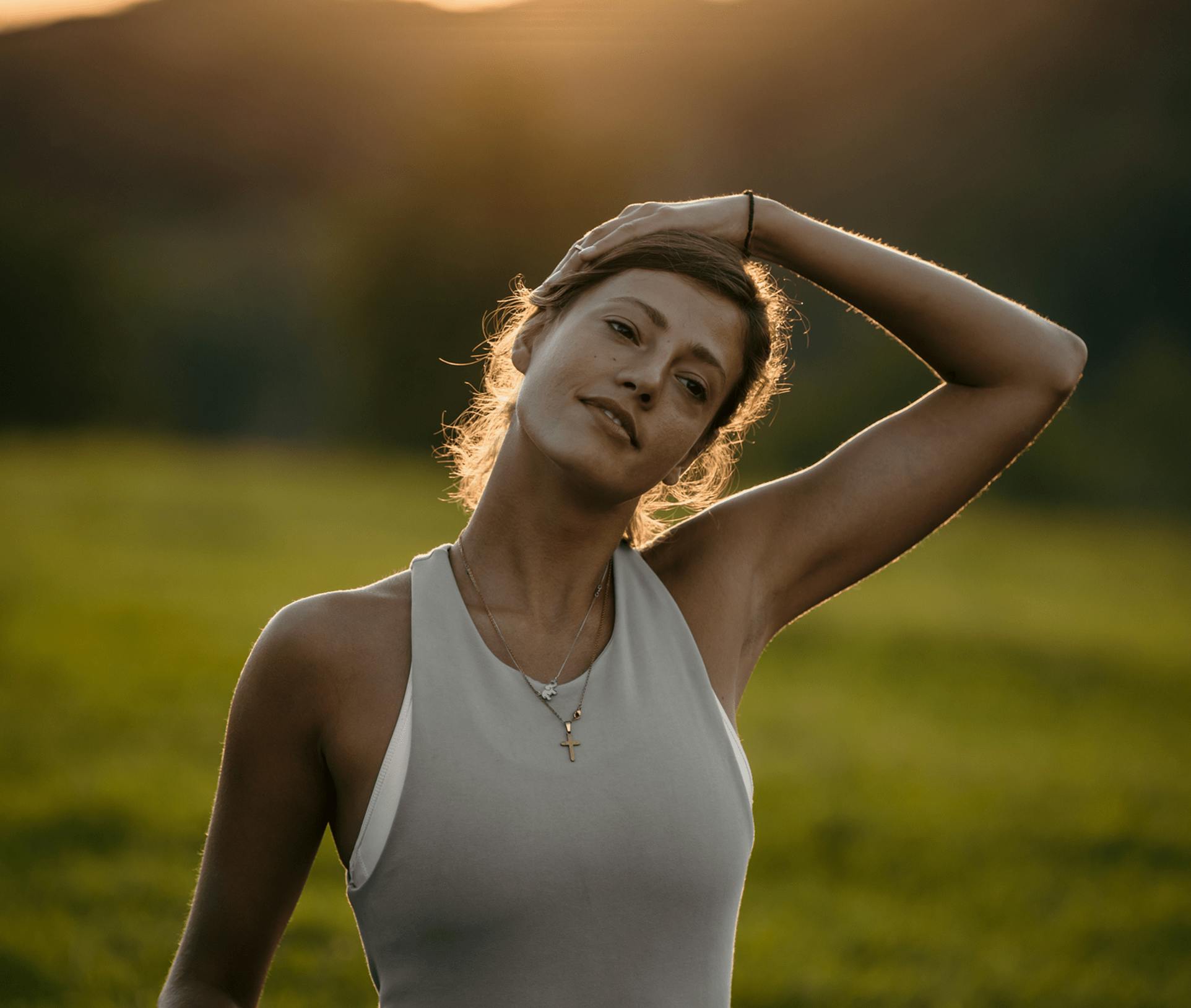 woman with her hand on her head