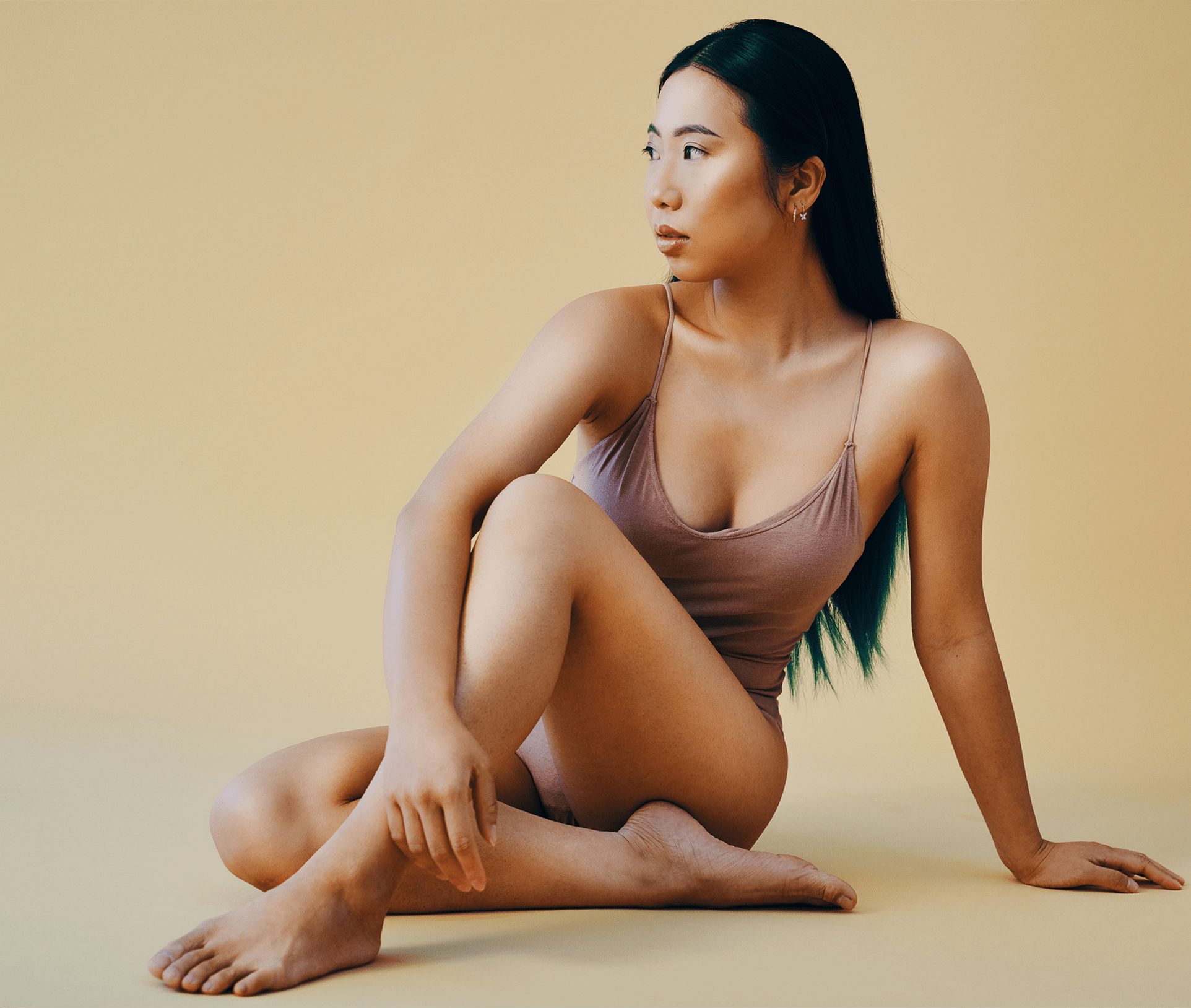 woman sitting on the ground