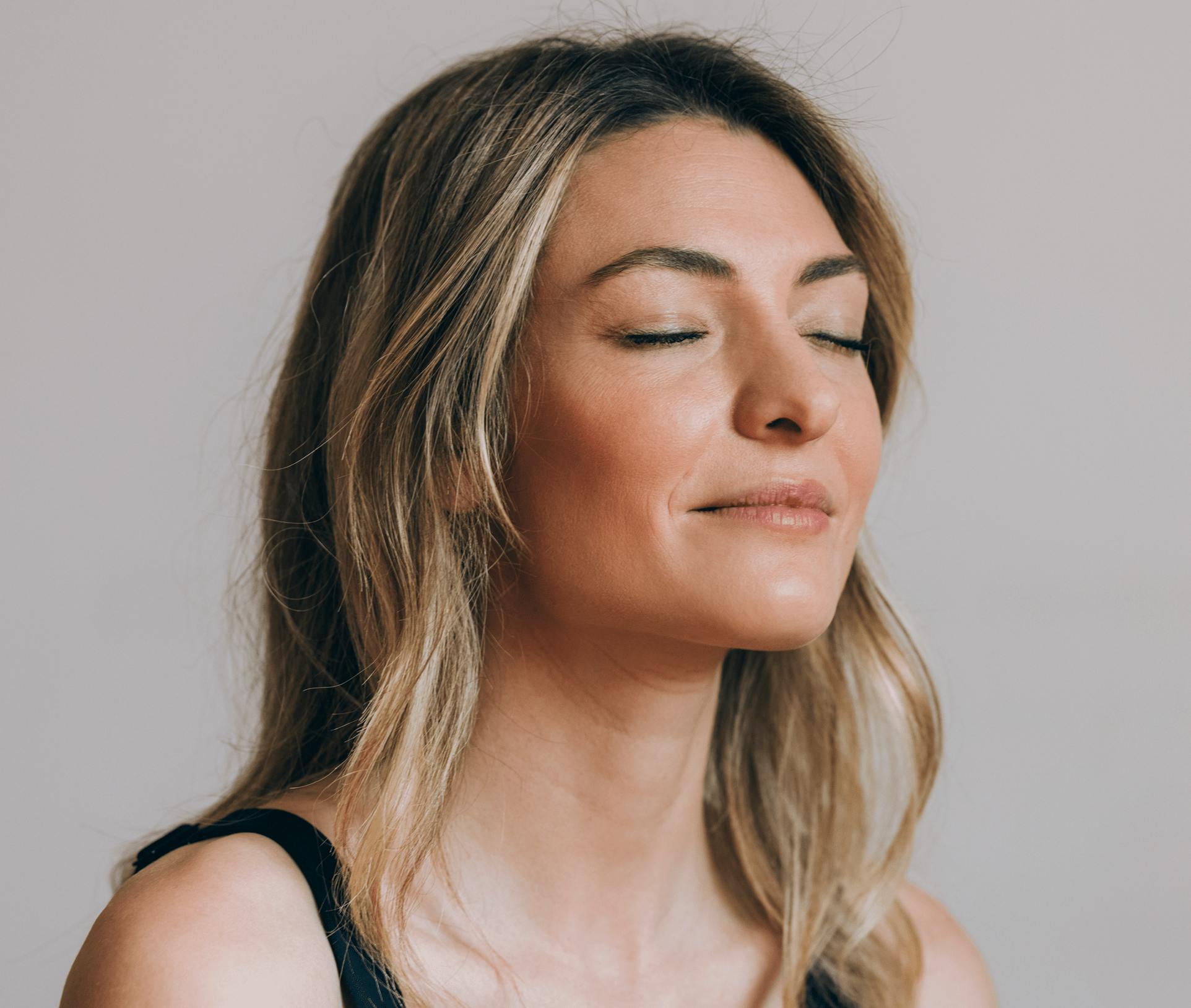 woman with her eyes closed