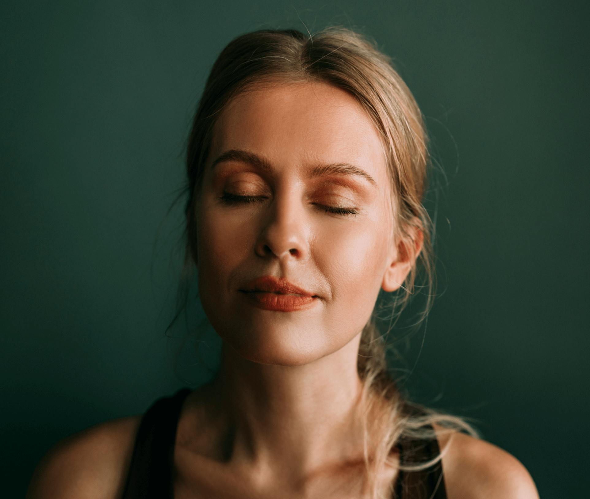 woman with her eyes closed