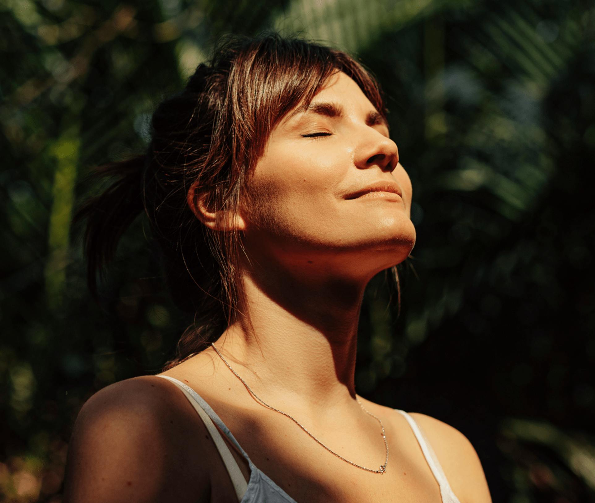 sun shining on woman's face