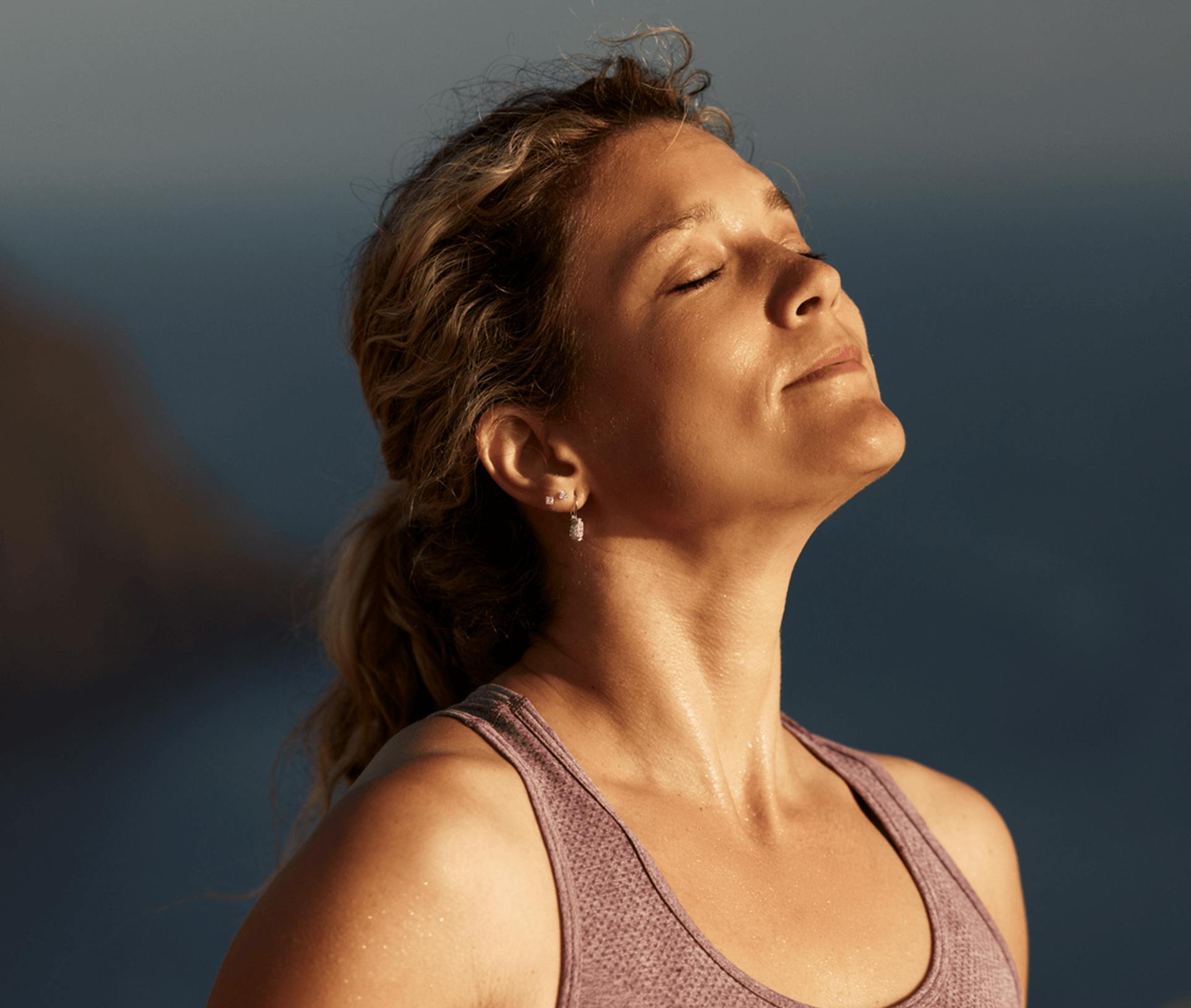 sun shining on woman's face