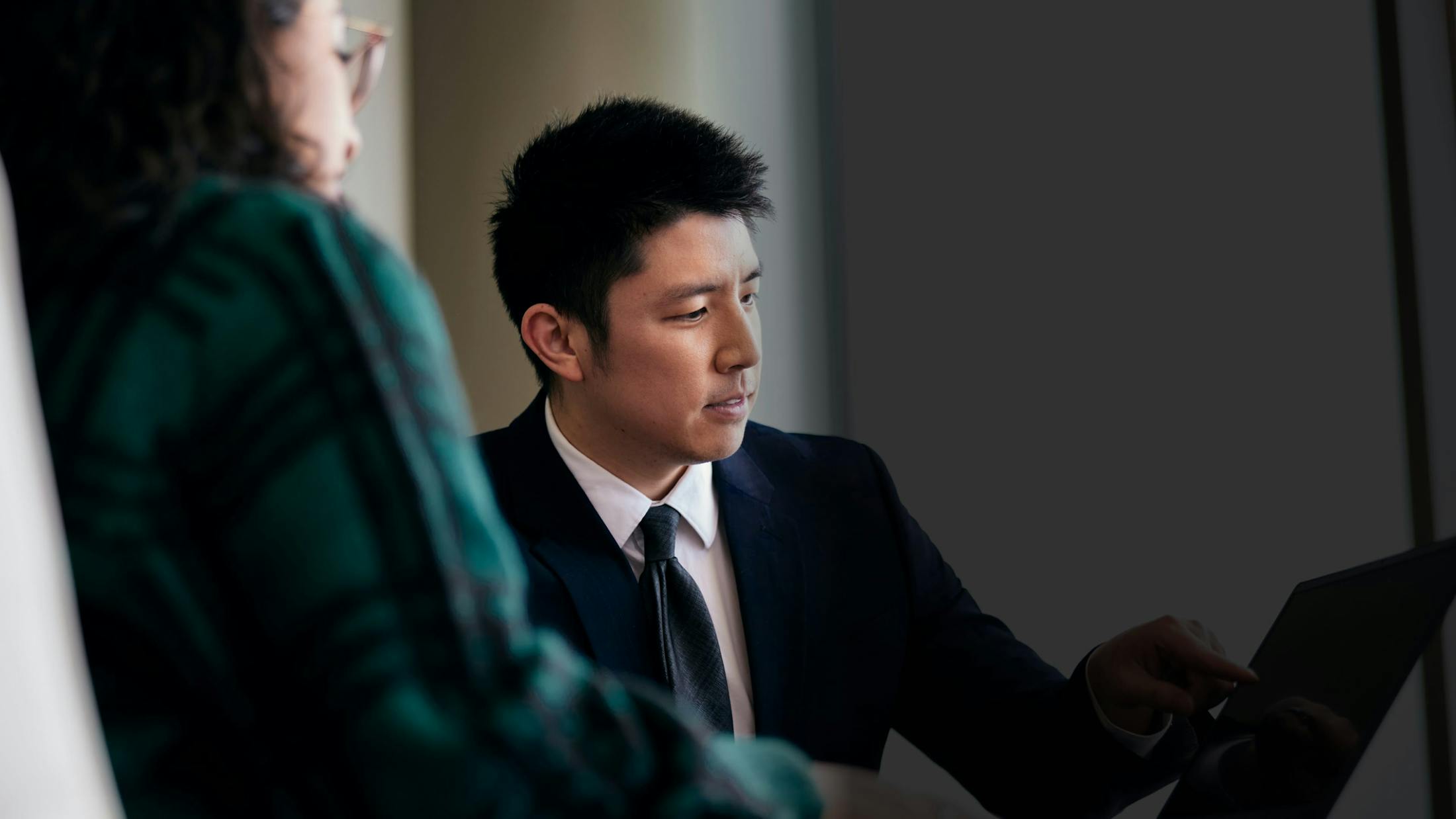 Man typing on a tablet