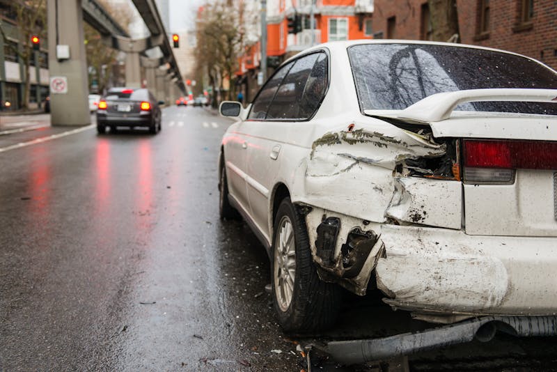 A side swiped white car