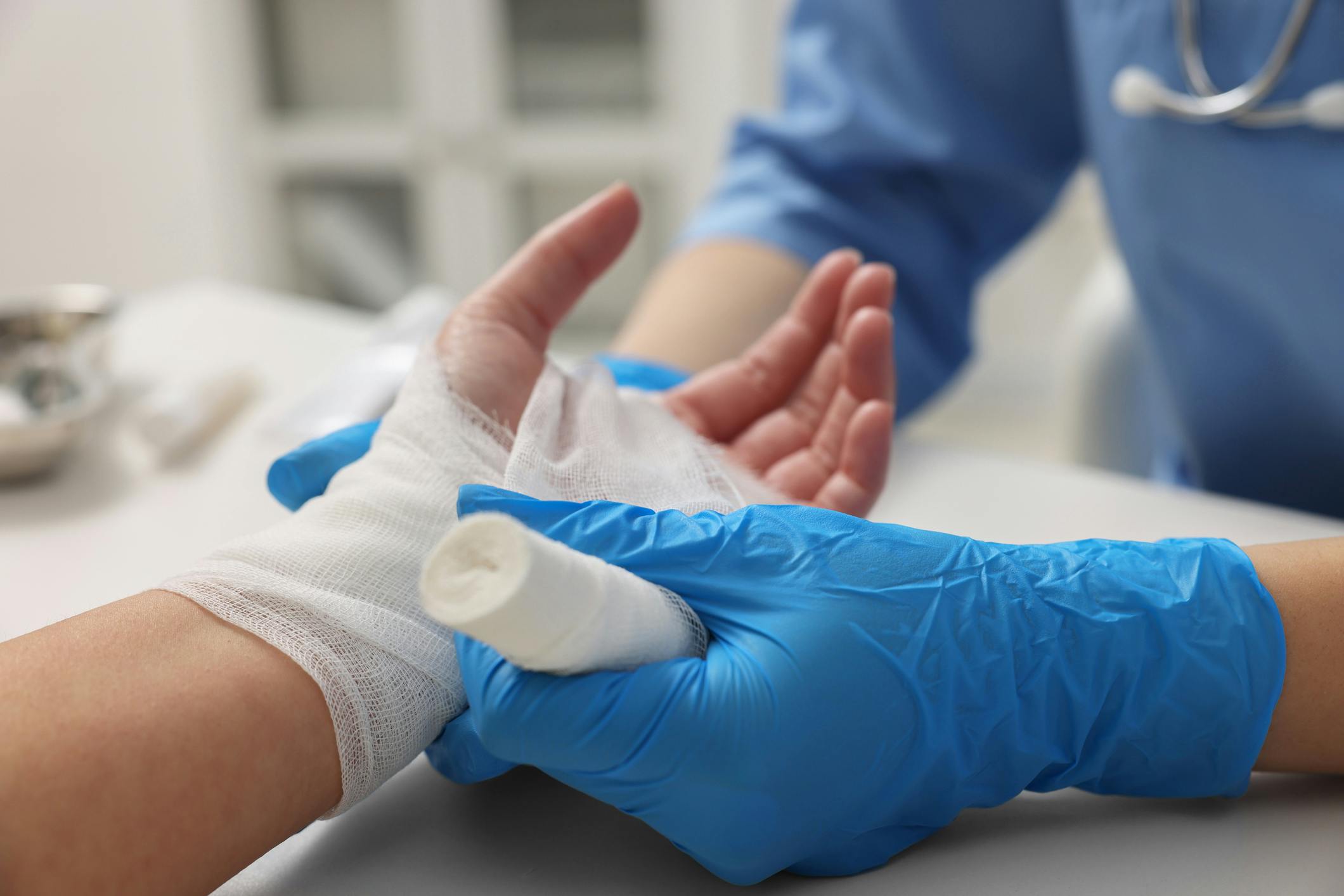doctorn putting healing bandages on a patient