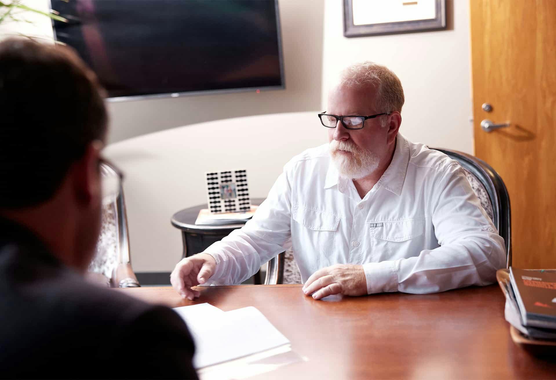Man sitting at a desk