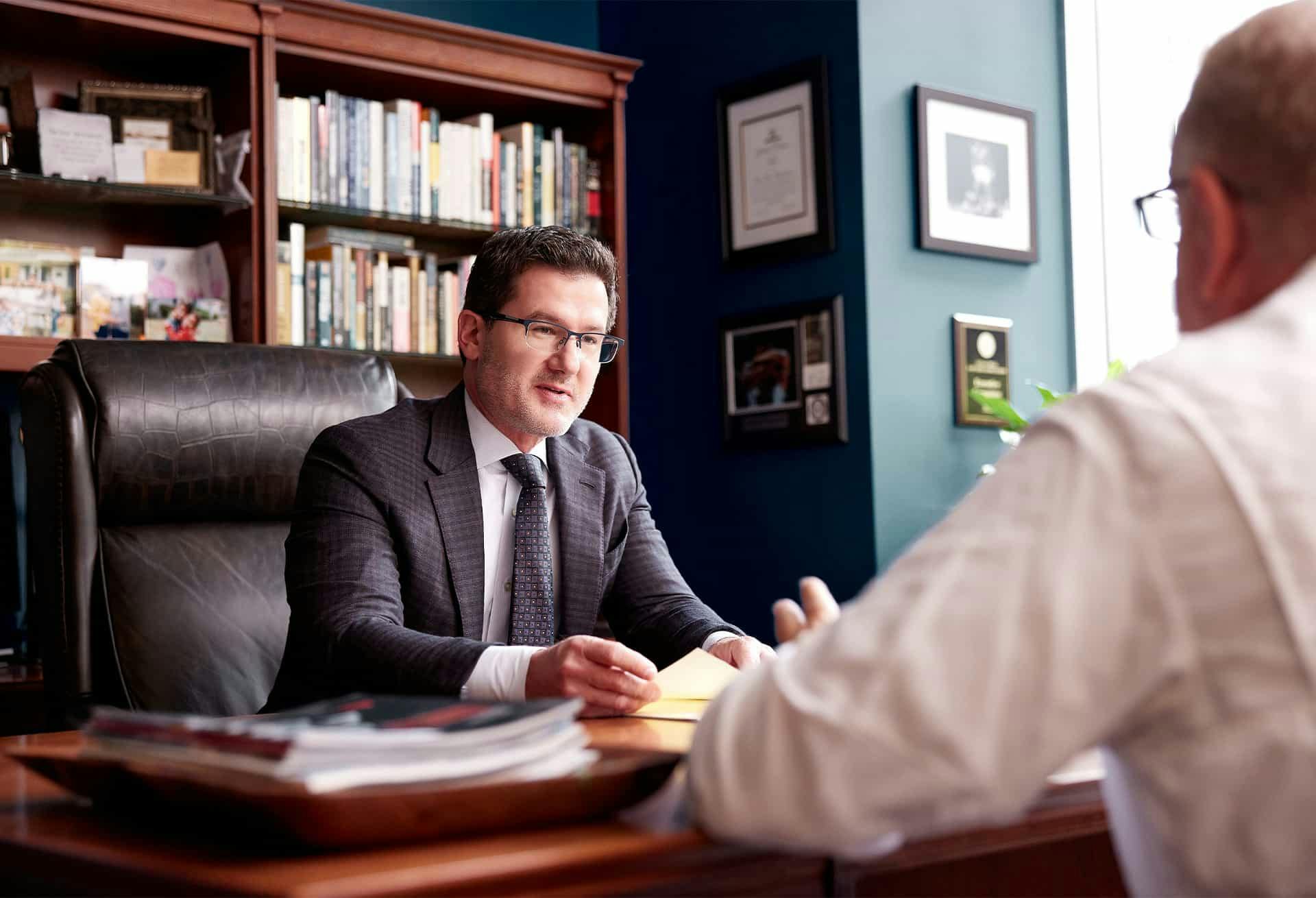 Man speaking to lawyer