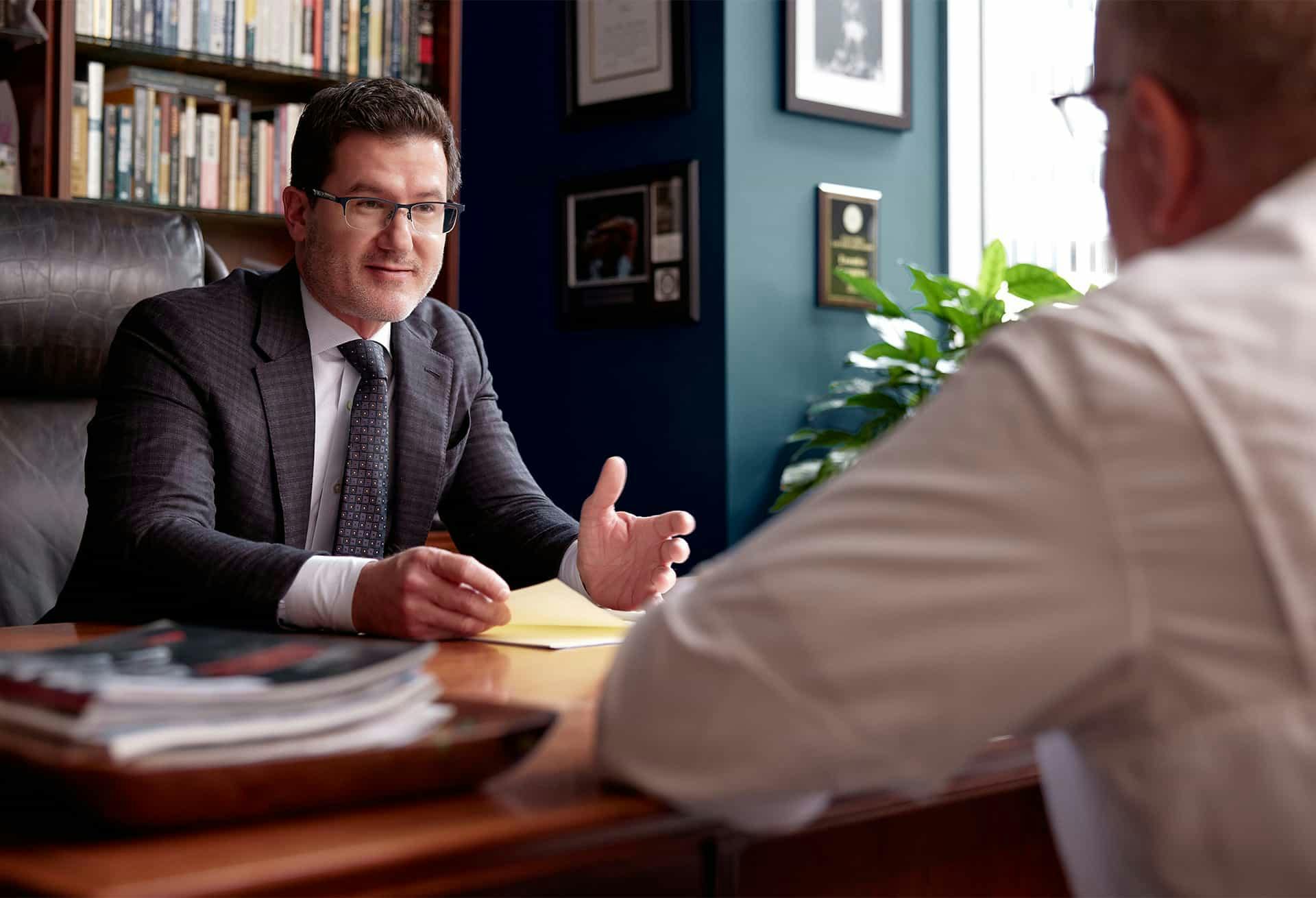 Joshua P. Davis with clients