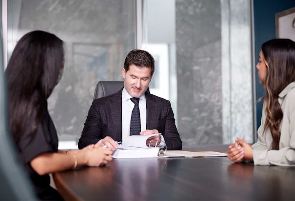 Joshua P. Davis with clients