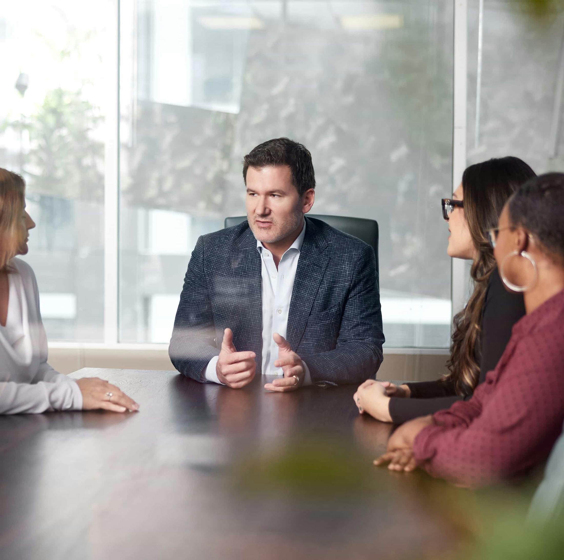 Joshua P. Davis with clients