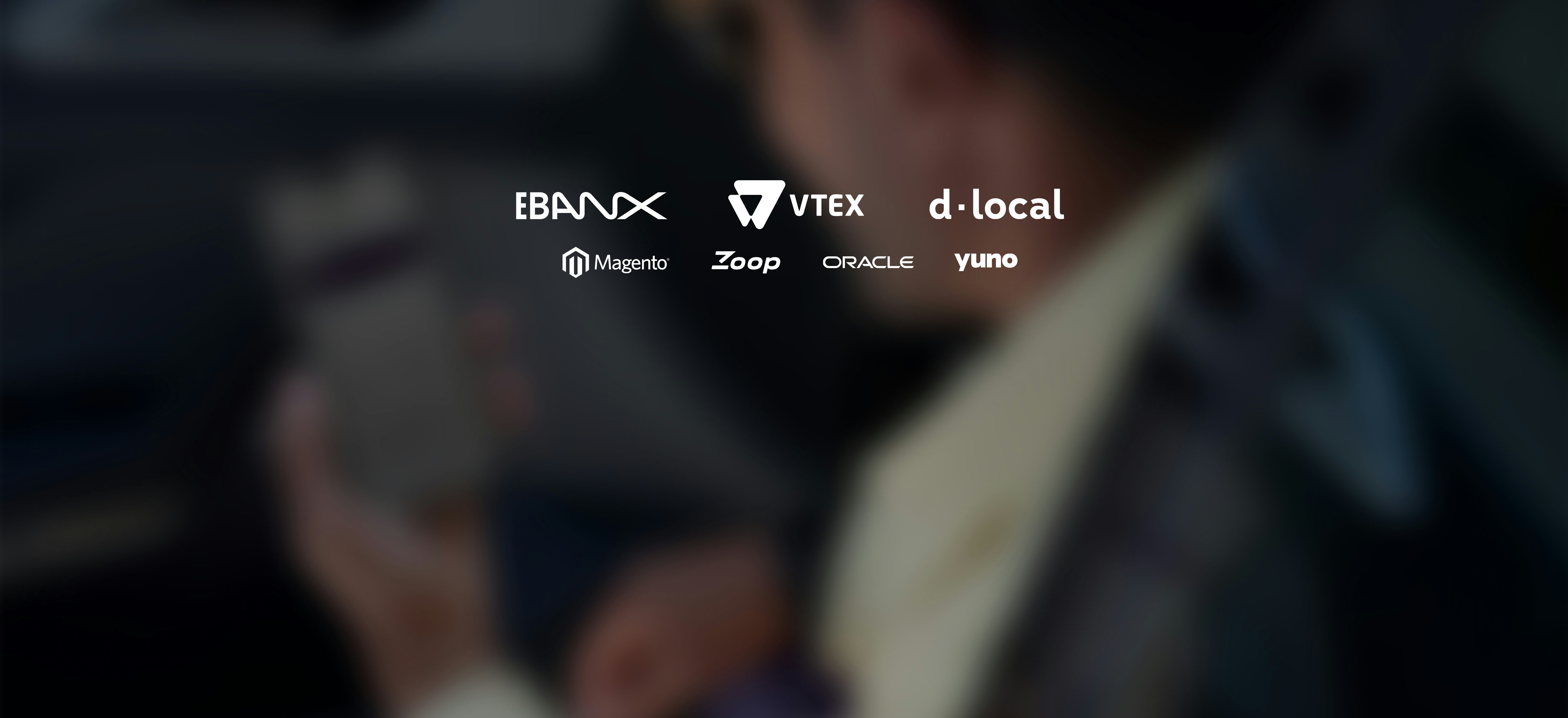 Imagem mostra logotipos das empresas parceiras do NuPay.:  Vtex; EBanx; d-local; Magento; Zoop; Yuno e Oracle.