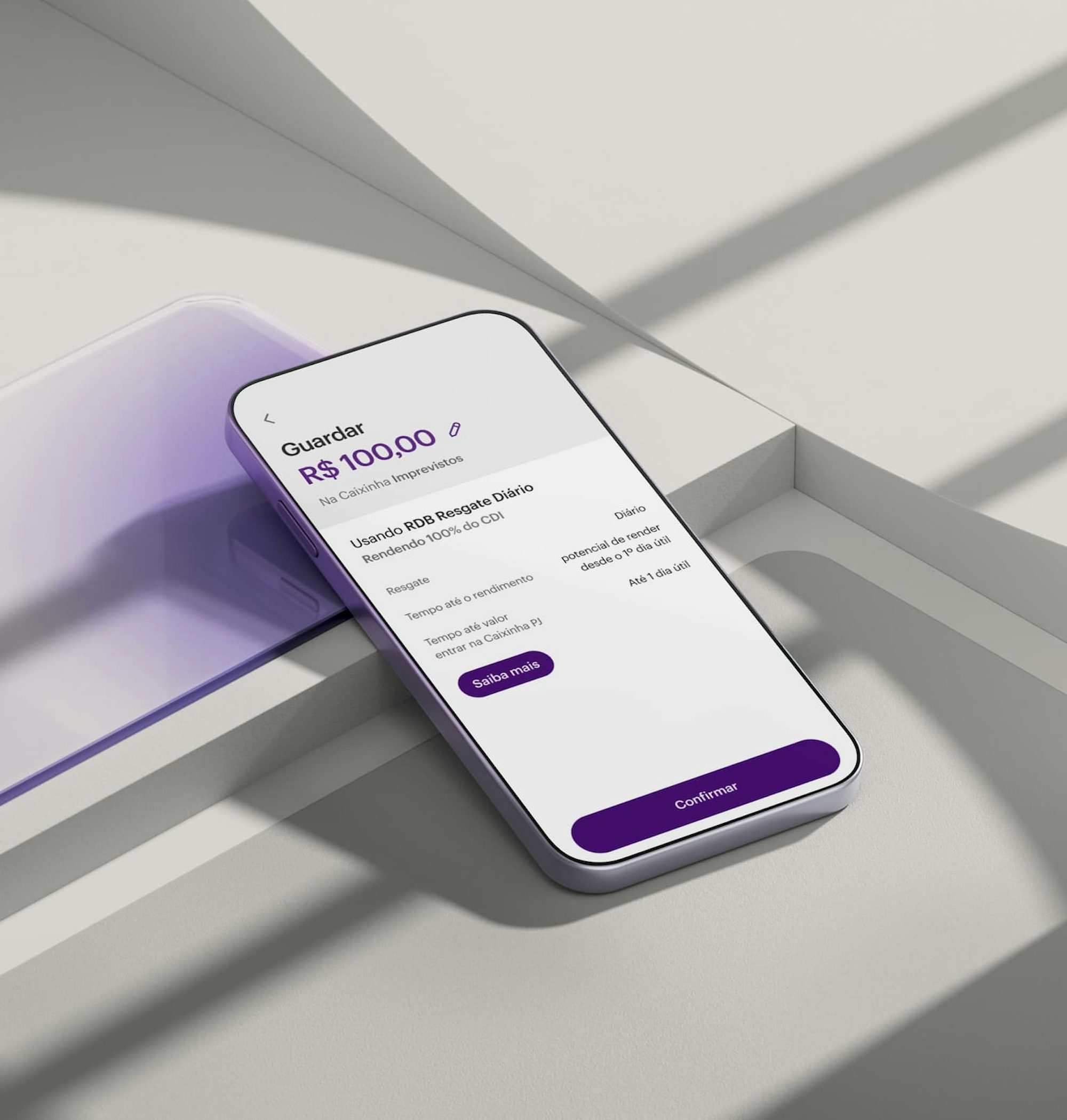 Celular com aplicativo Nubank aberto na tela de Caixinhas PJ. O aparelho está apoiado em uma forma geométrica.