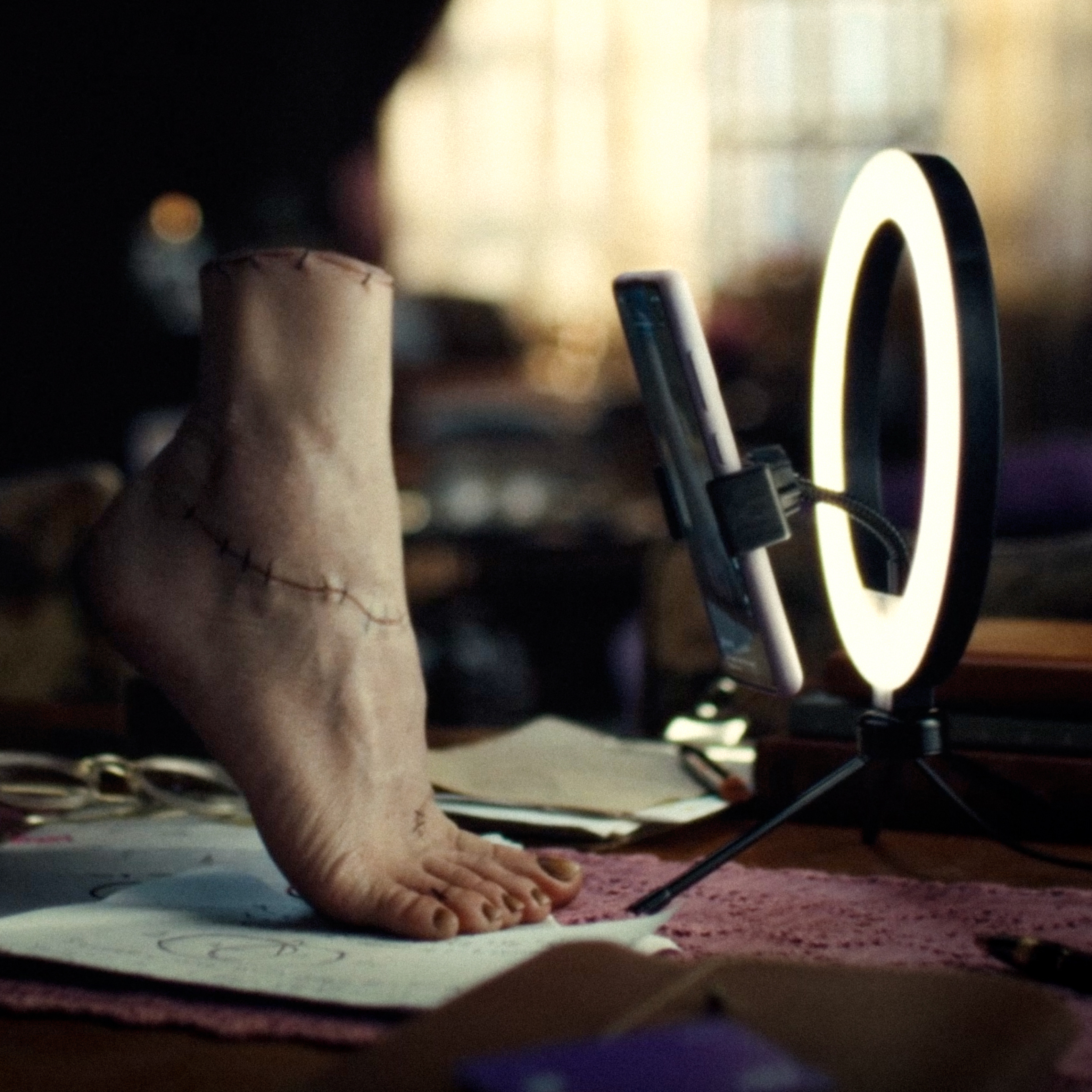 Pezinho na frente do celular