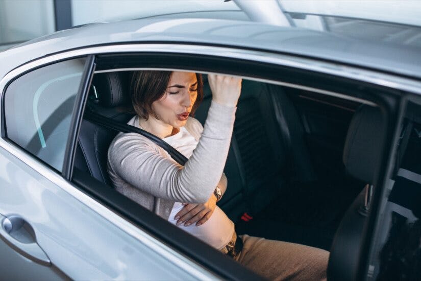 Pregnant Women In Car