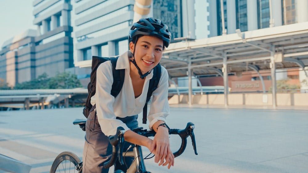 A Smiling Cyclist Looking At The Camera