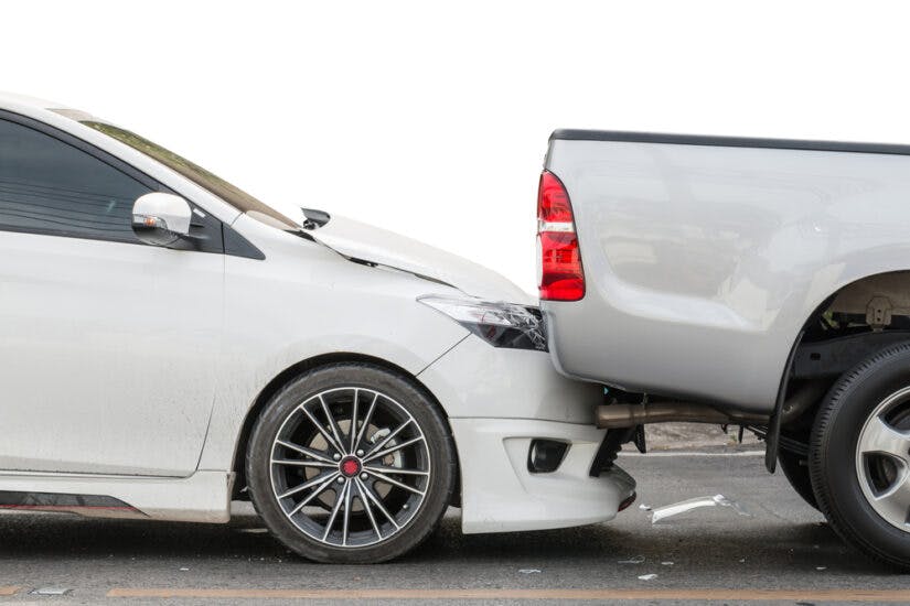 Photo of Car Accident Involving Two Cars on the Road