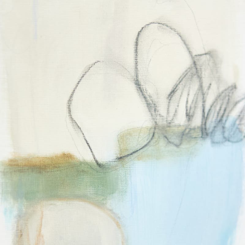 a paper with scribbles and some green and blue paint on it