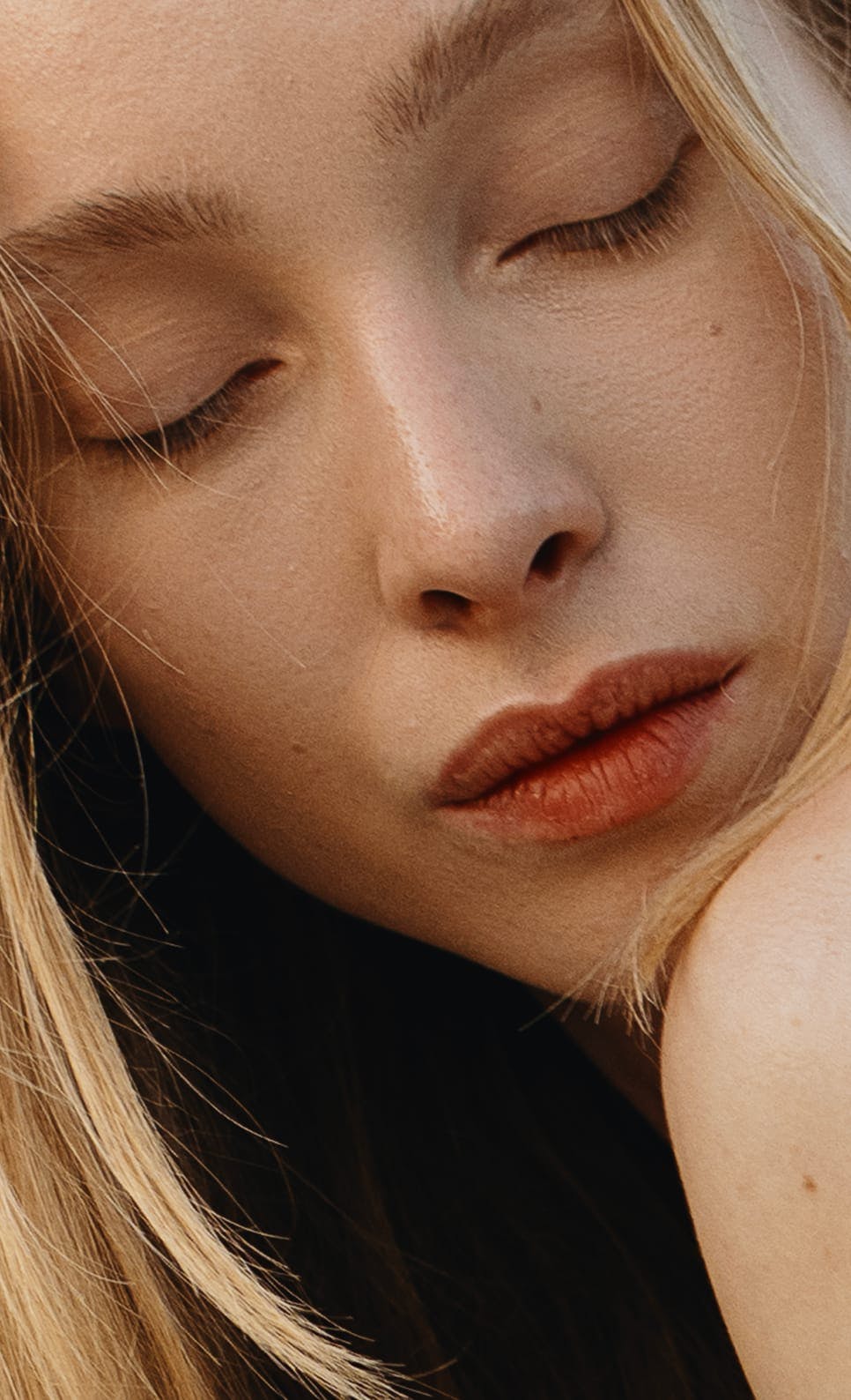 Woman with her eyes closed