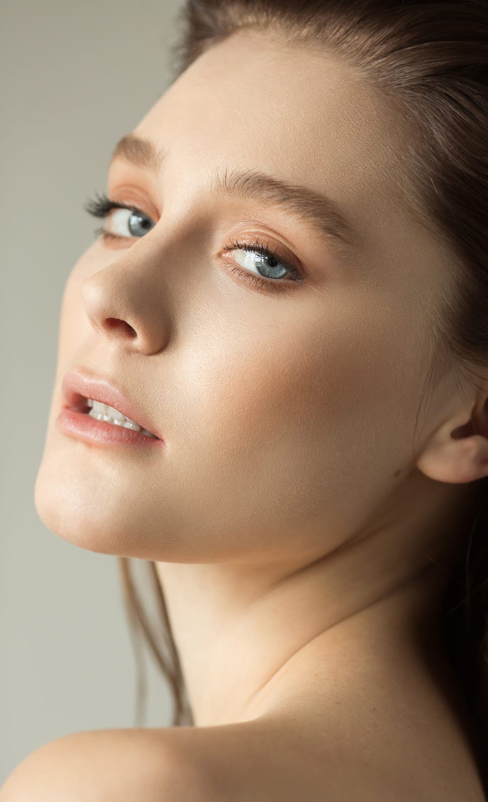 Woman looking over her shoulder