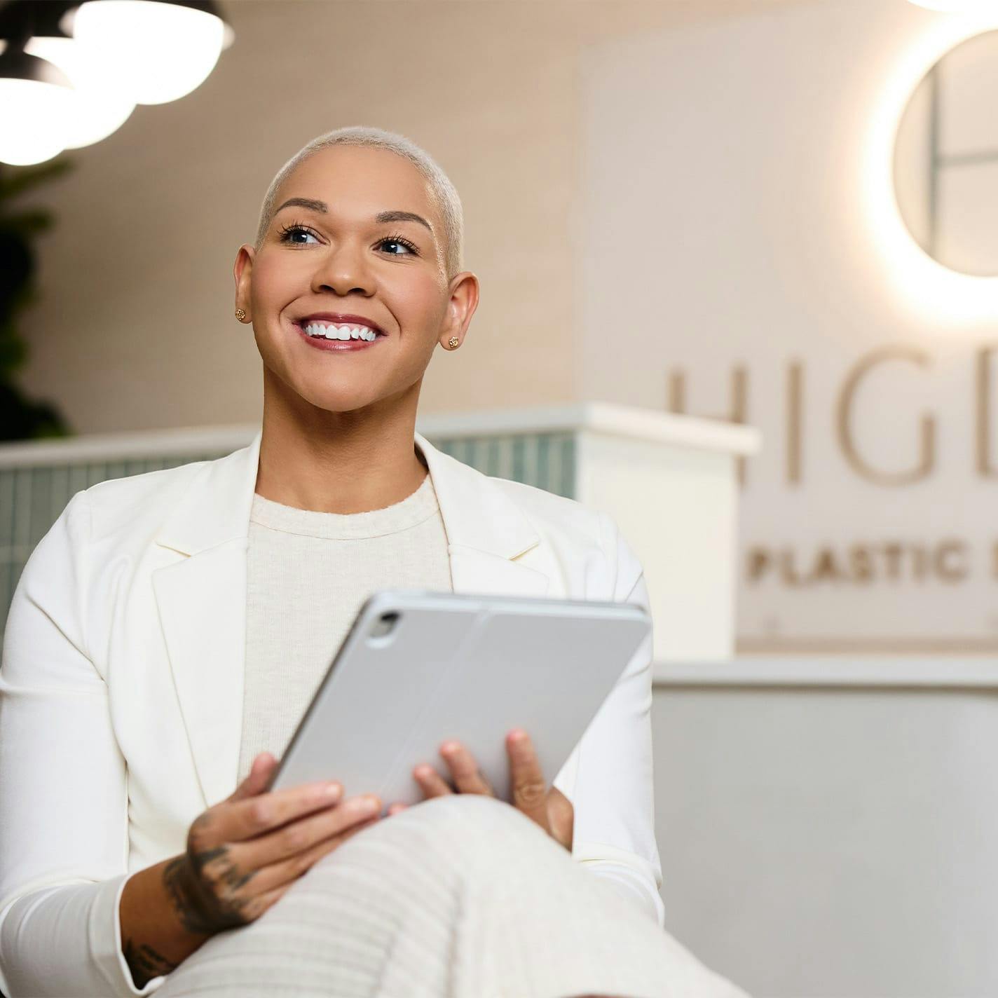 patient holding Ipad sitting down