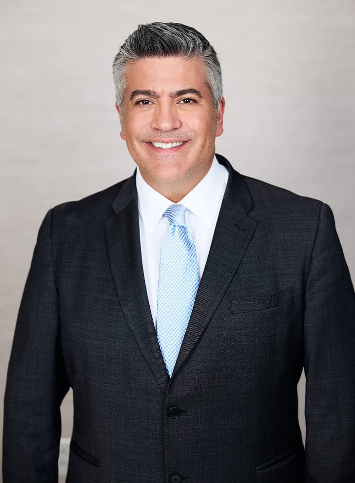 Dr. Higdon in black suit