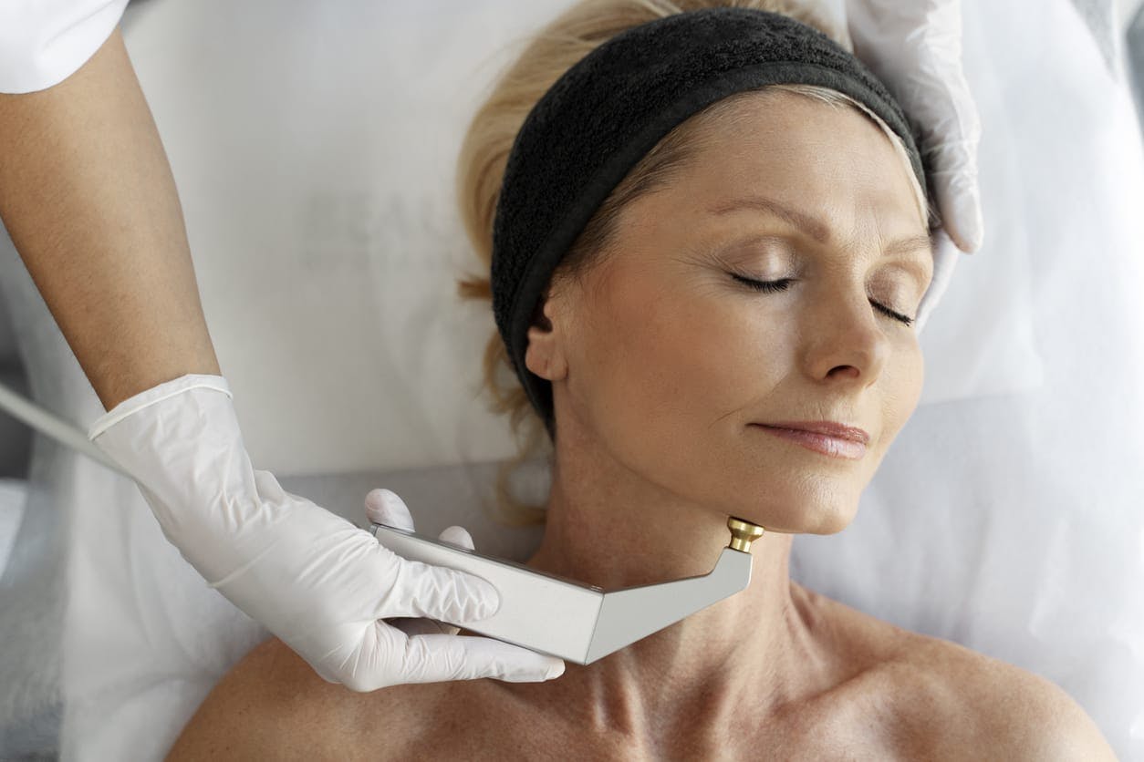 woman recieving skin tigheting