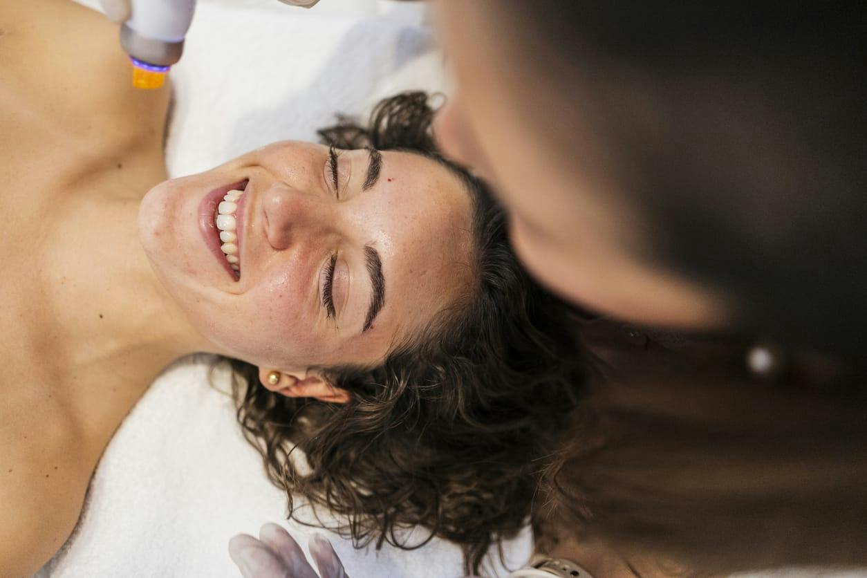 woman getting laser therapy