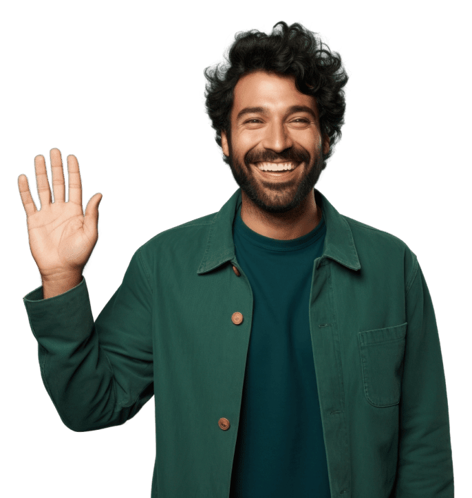 A picture of a multicultural man wearing a green jacket. He is smiling and waving with his right hand