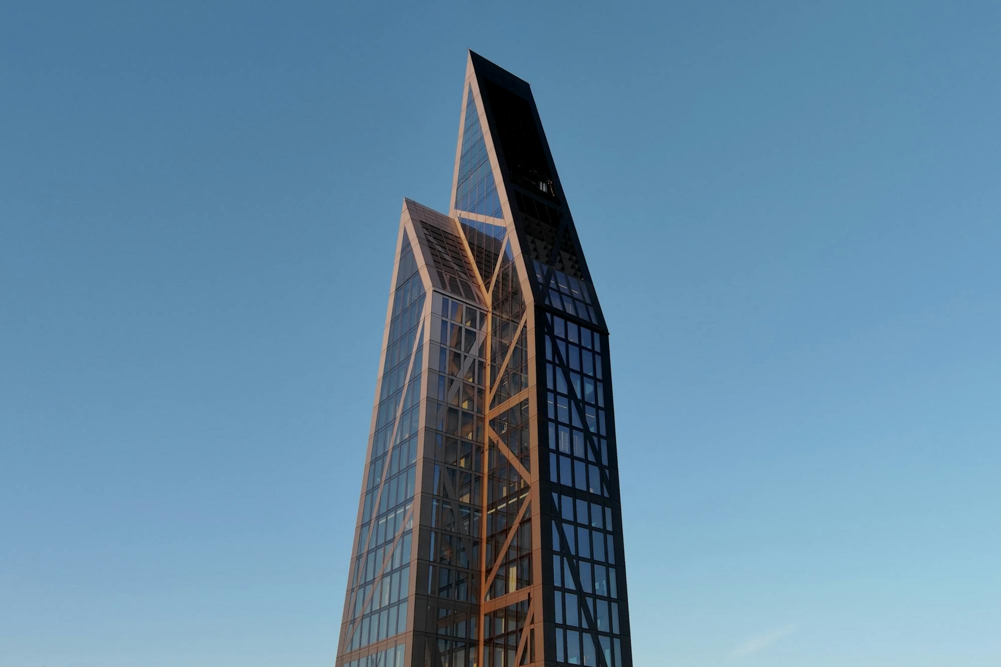 Closeup of condominium tower with light filled residences