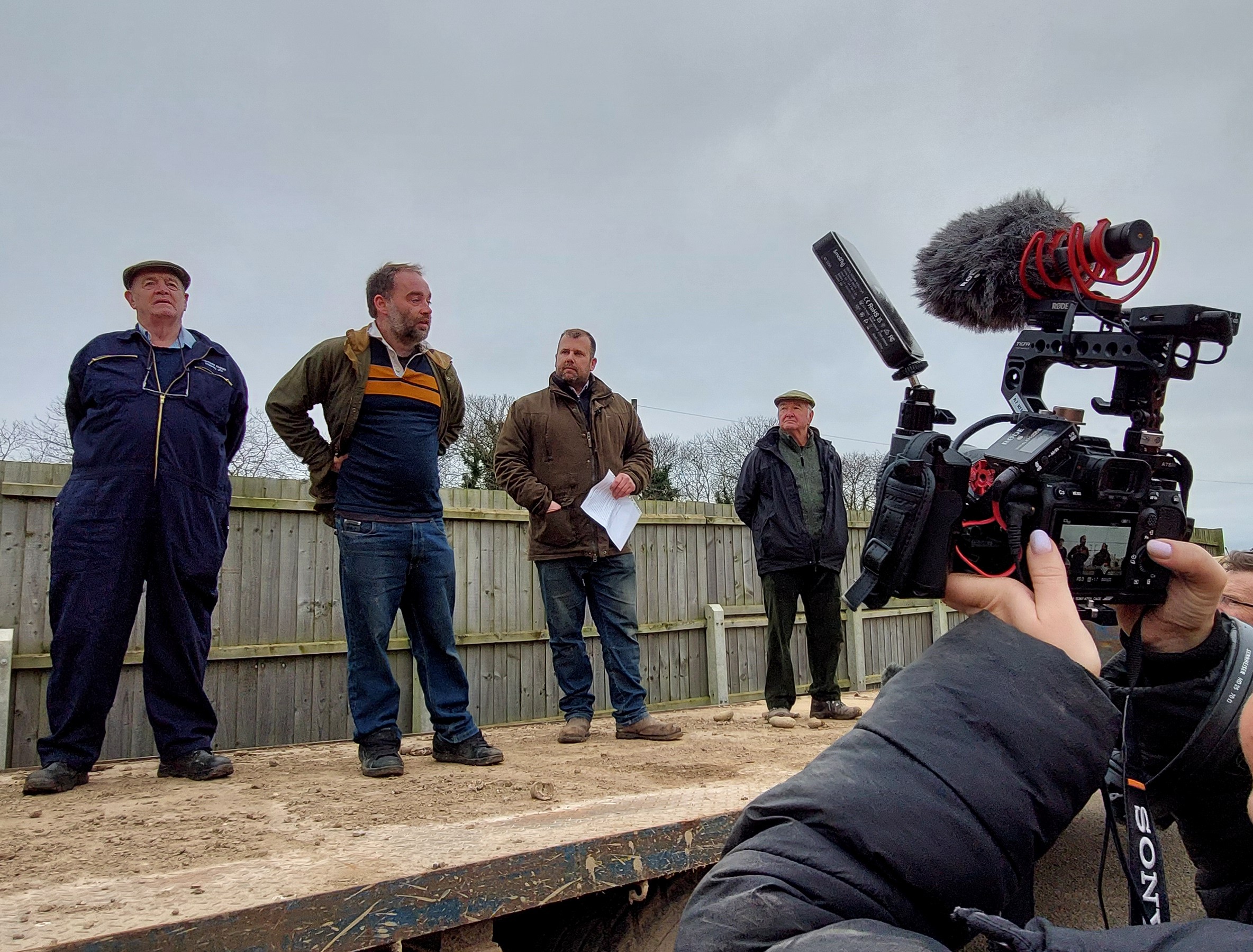 Tractor protest organisers talk to farmers and members of the press