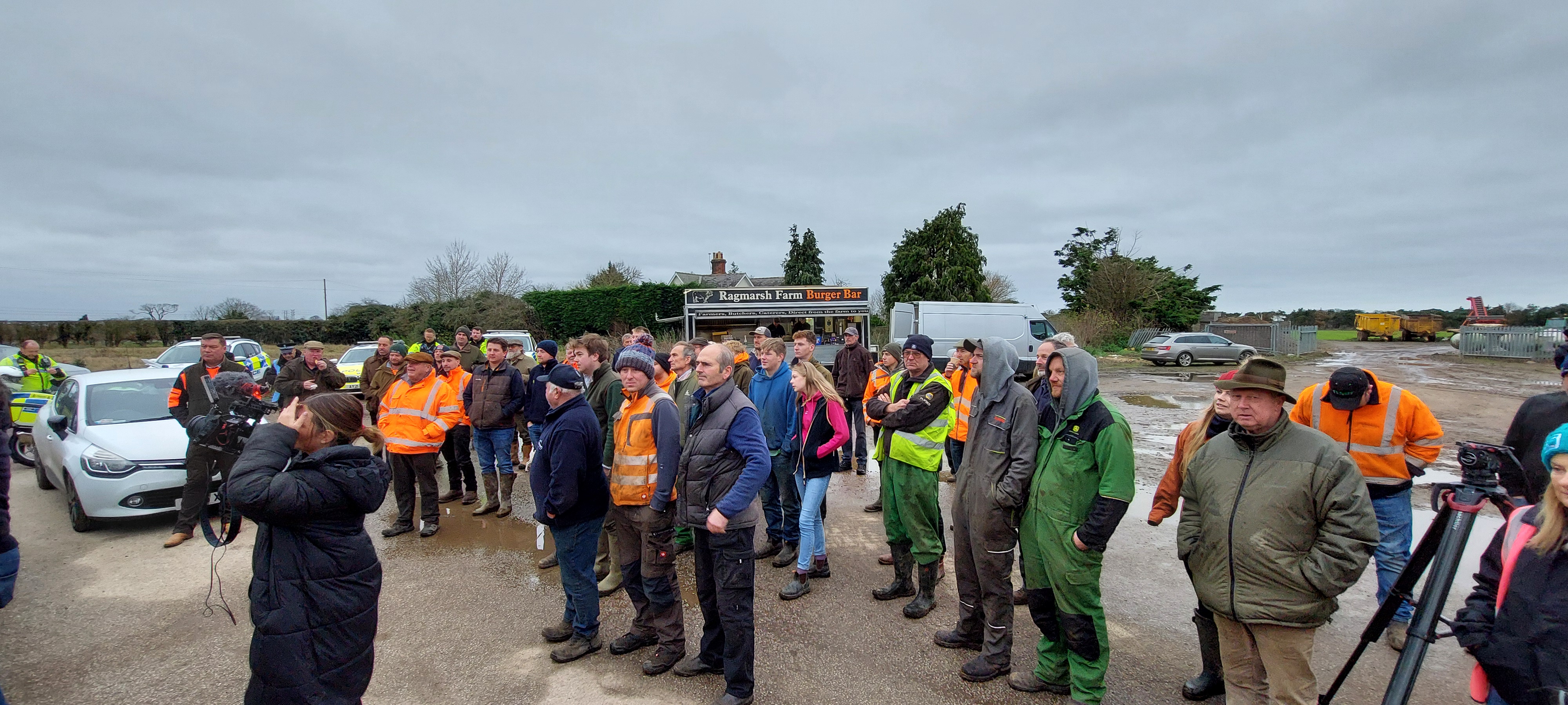 Local farmers gathered with members of the press before setting off