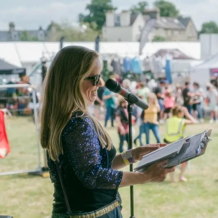 Amy Wragg performing poetry at a Festival