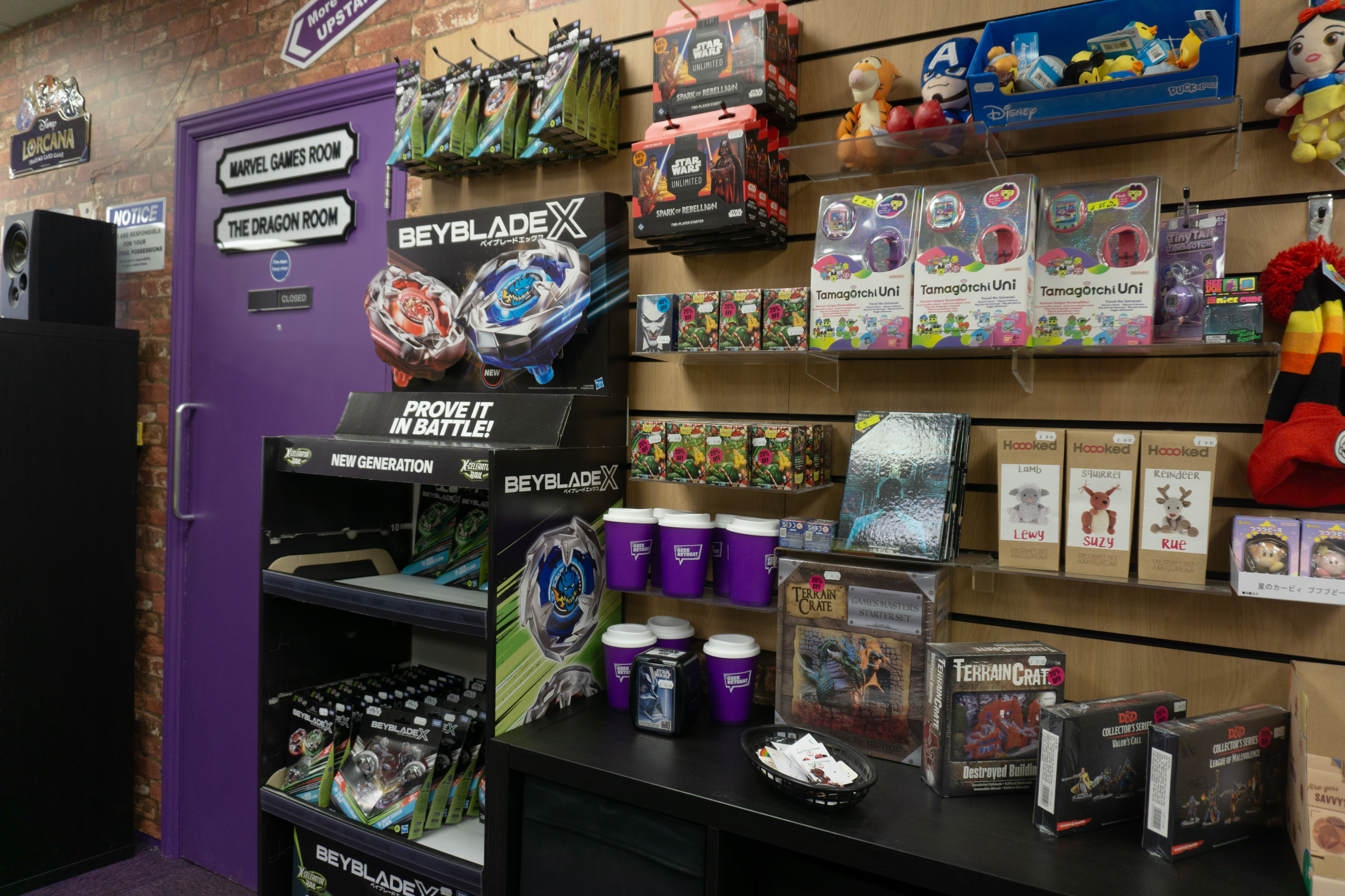 Games and toys on a retail display unit at Geek Retreat