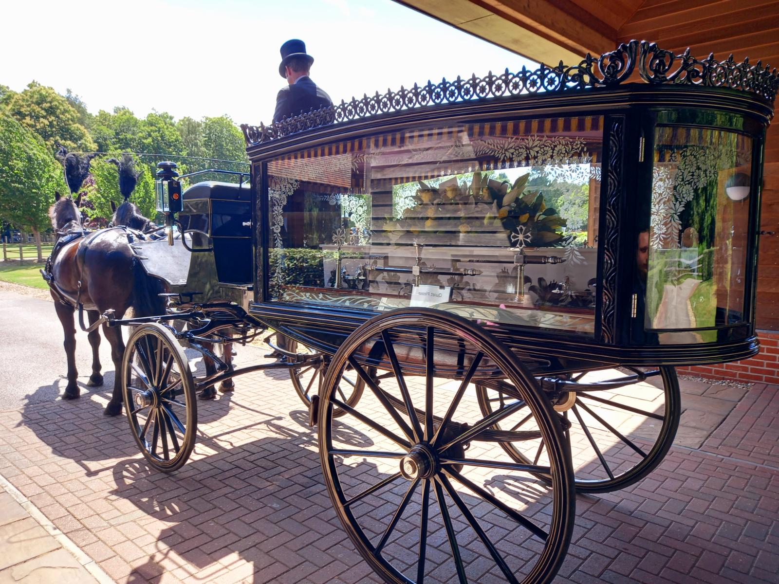 A horse-drawn casket