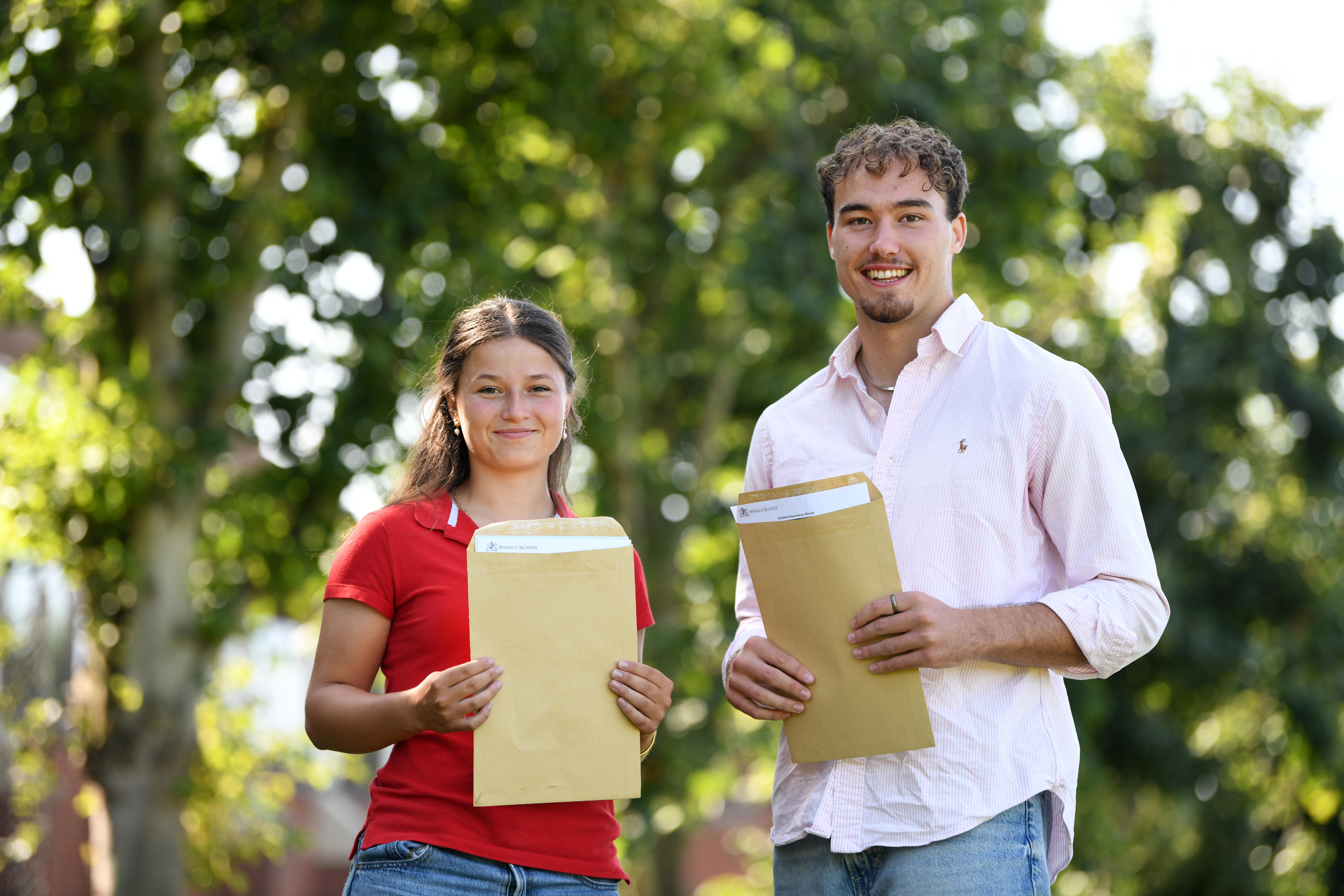 Two Ipswich School students collecting their A Level results