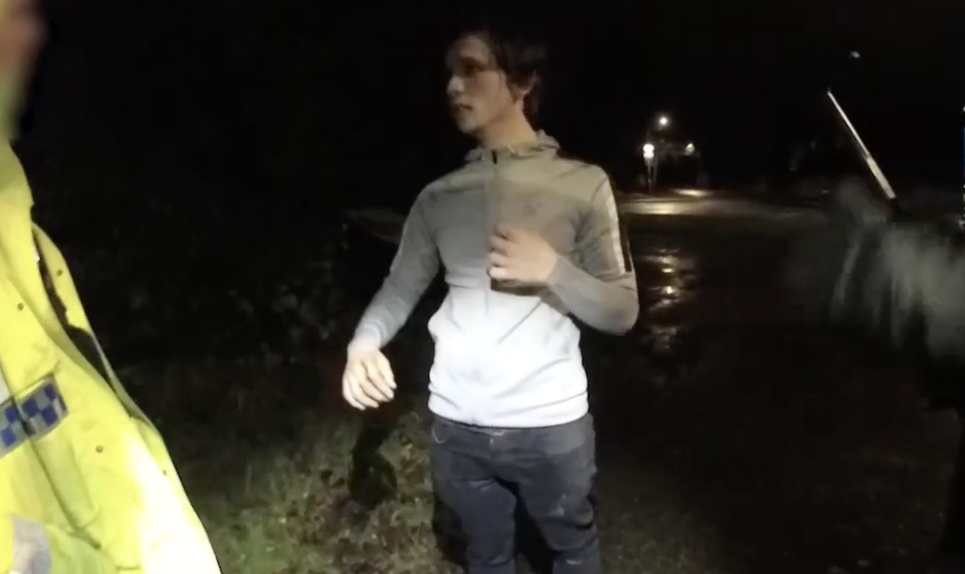 Elliott Mallett talking police officers on the night of the attack