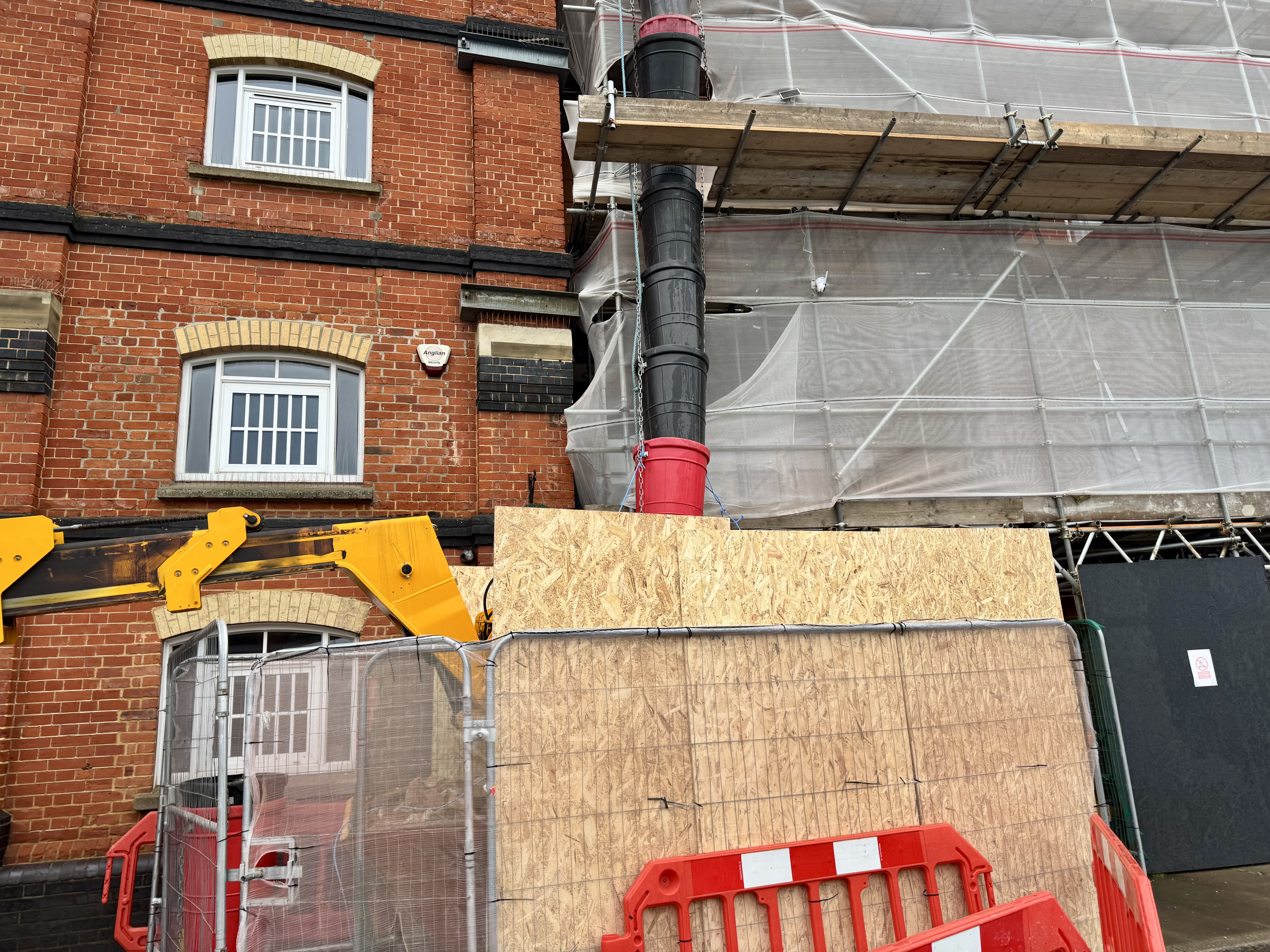 A rubble chute takes rubble down from the upper floors into a large skip
