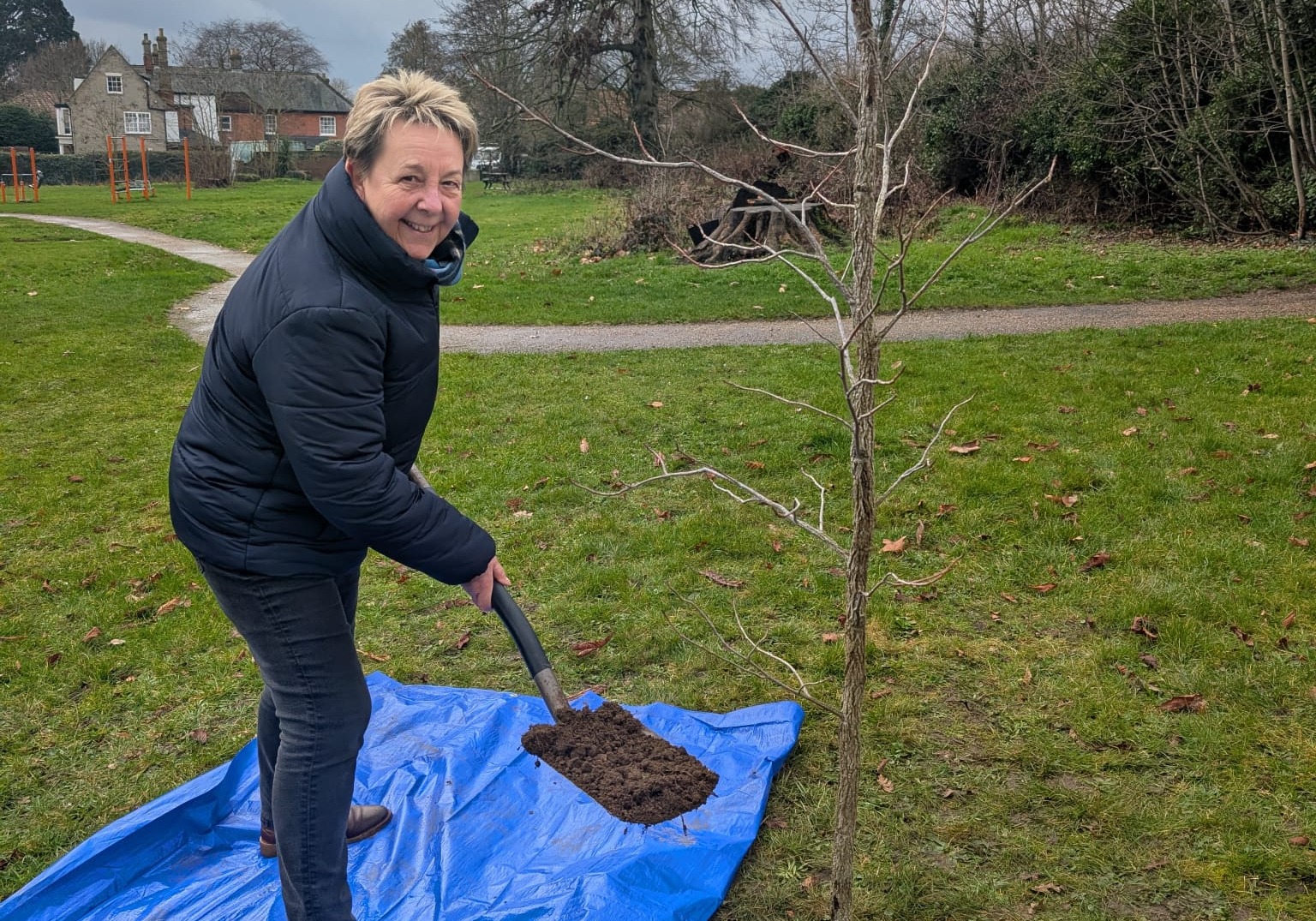 Councillor Lucy Trenchard planting a tree
