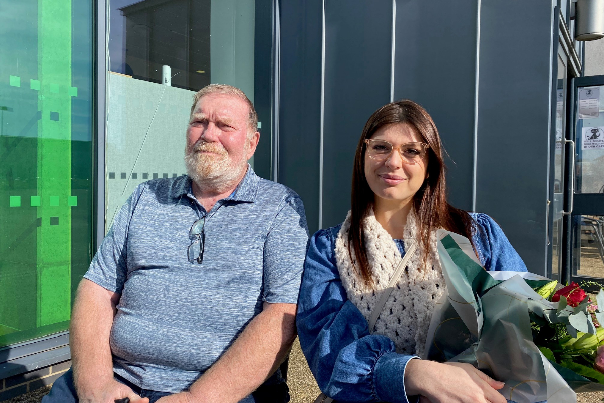 University of Suffolk student Rosita Nibi and local resident Alan Mison at the Coffee Cat cafe in the James Hehir Building.