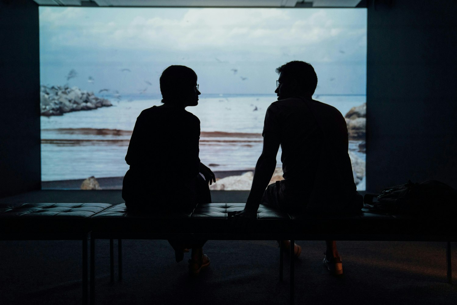 Couple talking in the dark