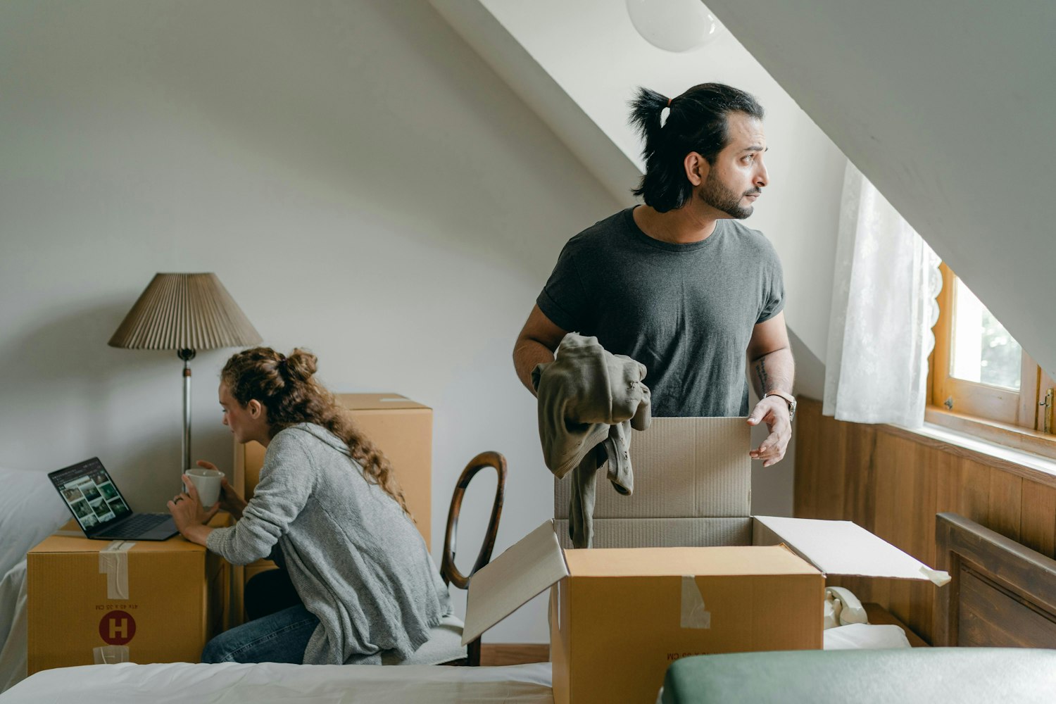 Couple doing their own thing