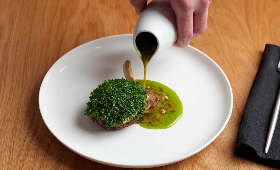 Roast veal cutlet, veal jus Gras split with jalapeno Coriander oil